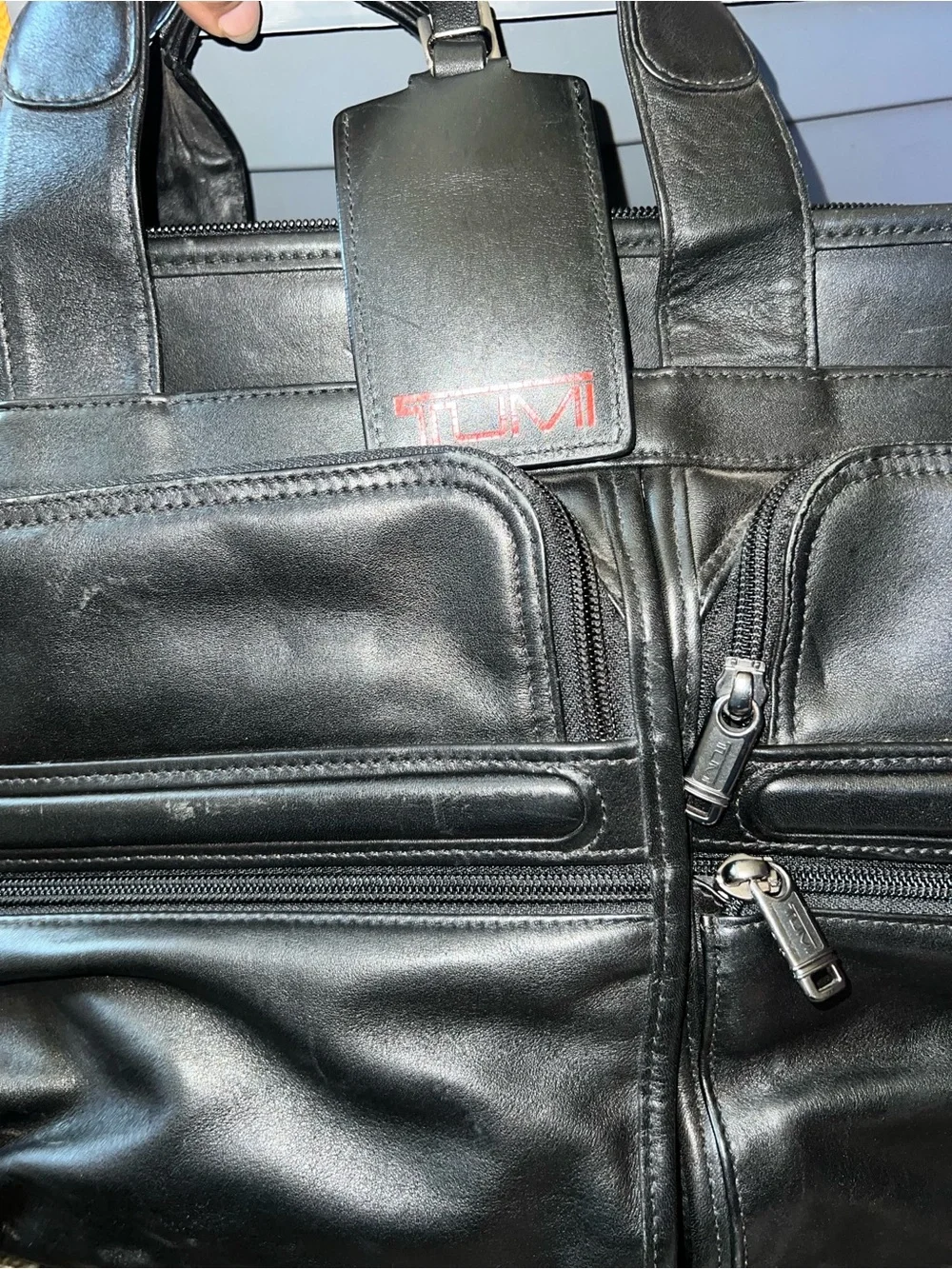 Tumi travel leather briefcase